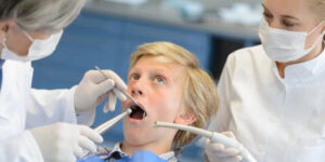 Adolescent-getting-a-dental-exam