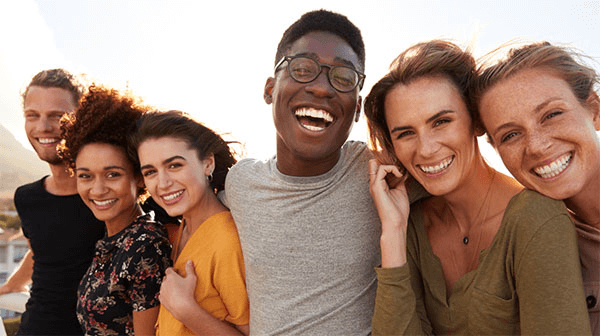 group of young adult friends smiling